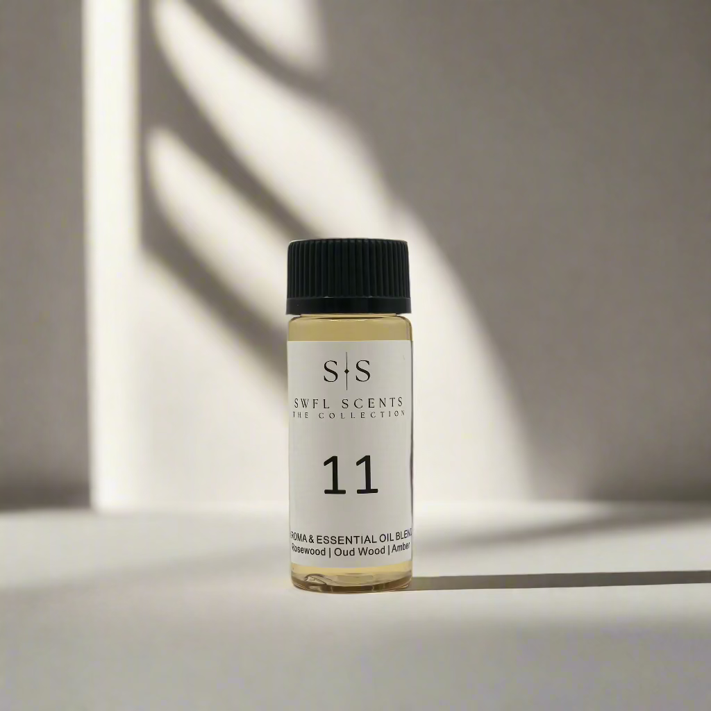 Essential oil bottle with S+S logo and rosewood scent